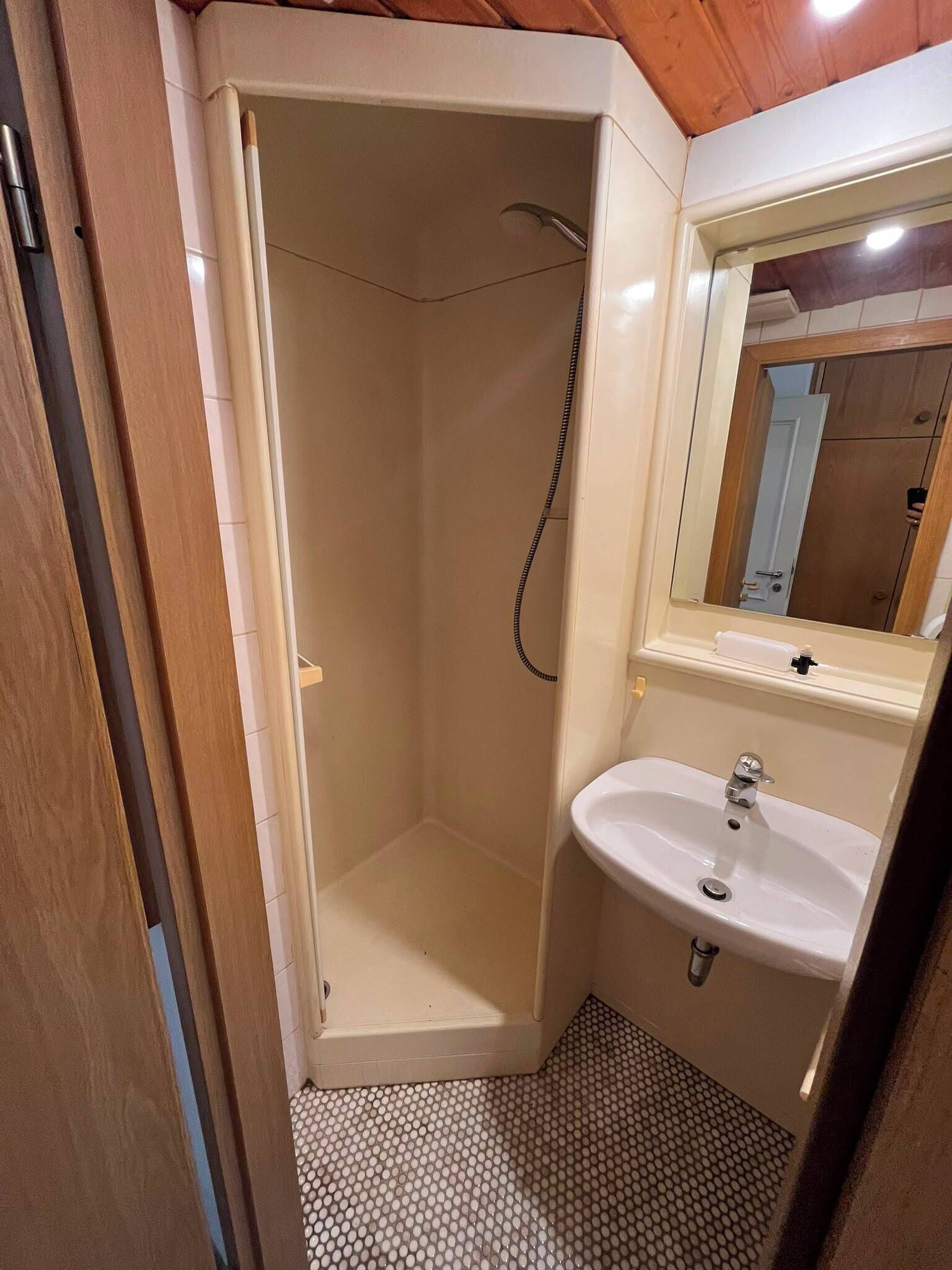 Basic Double Room, Shared Bathroom | Bathroom | Shower, towels, toilet paper