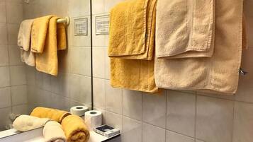 Shower, towels, toilet paper
