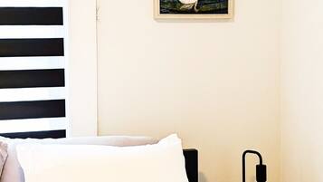 1 bedroom, desk, iron/ironing board, travel crib