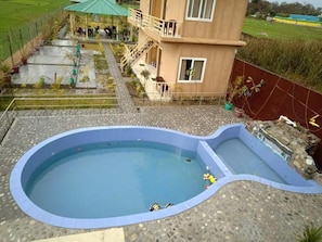 Habitación doble, vista a la alberca | Alberca
