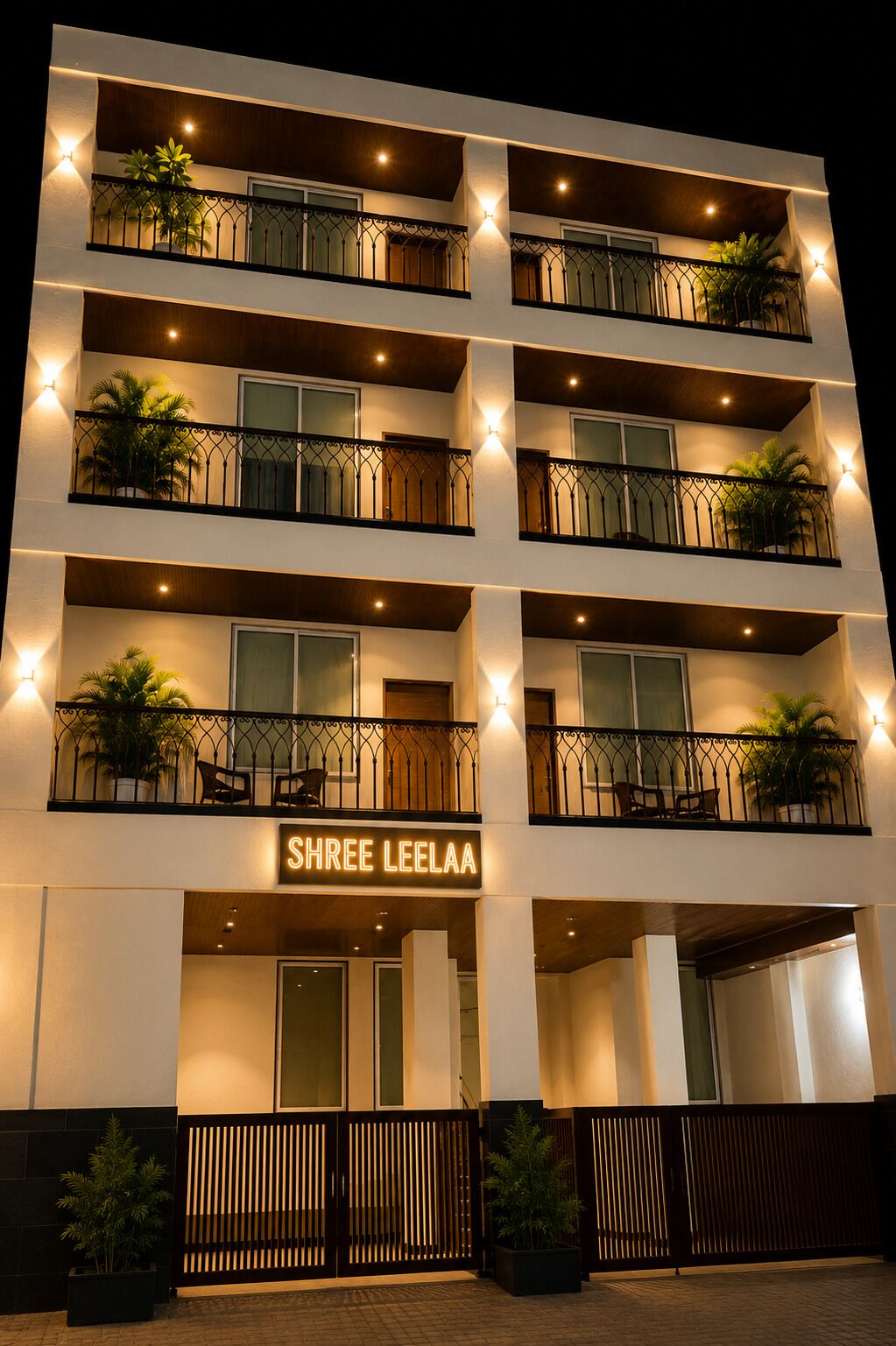 A multi-story hotel with balconies, potted plants, and a sign reading 'SHREE LEELAA'.