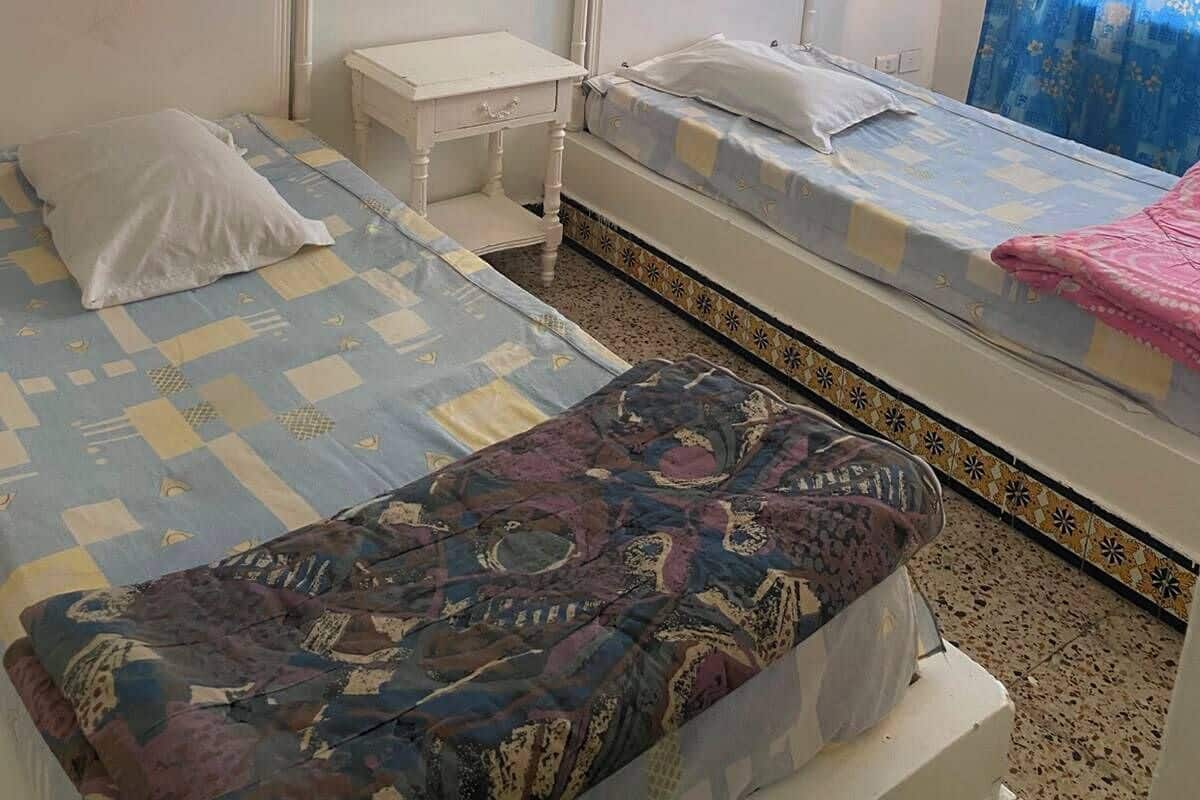 Laptop workspace, free WiFi, bed sheets
