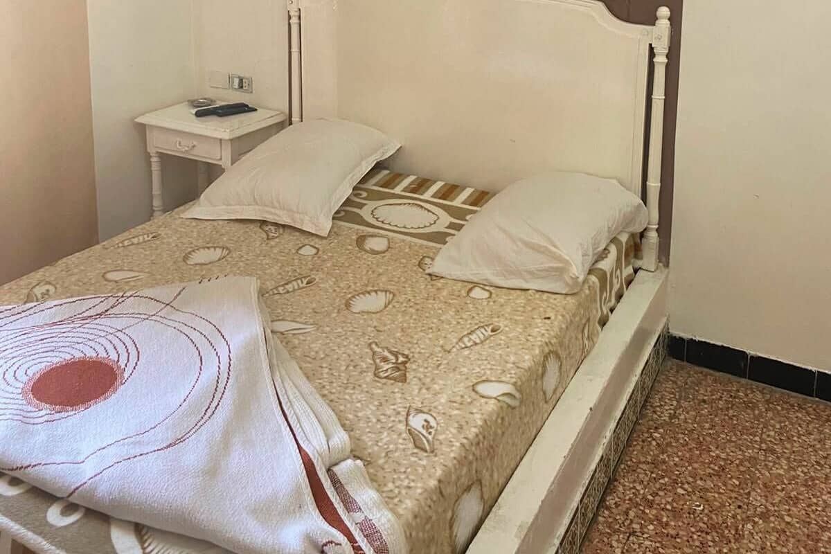Laptop workspace, free WiFi, bed sheets