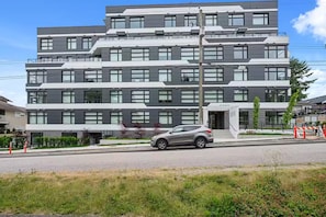 Exterior - 2BR Sleek City Nest • Balcony • 1 Min to SkyTrain (Vancouver)
