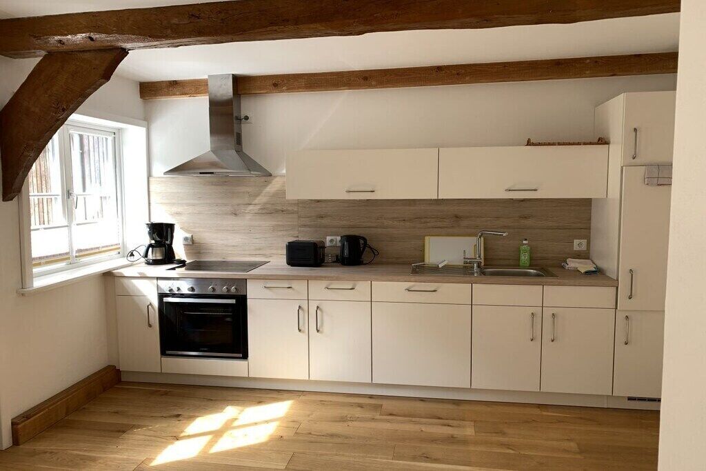 Coffee/tea maker, fridge, stovetop, dishwasher