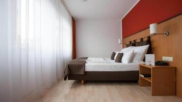 1 dormitorio, cuna de viaje, wifi gratis y ropa de cama