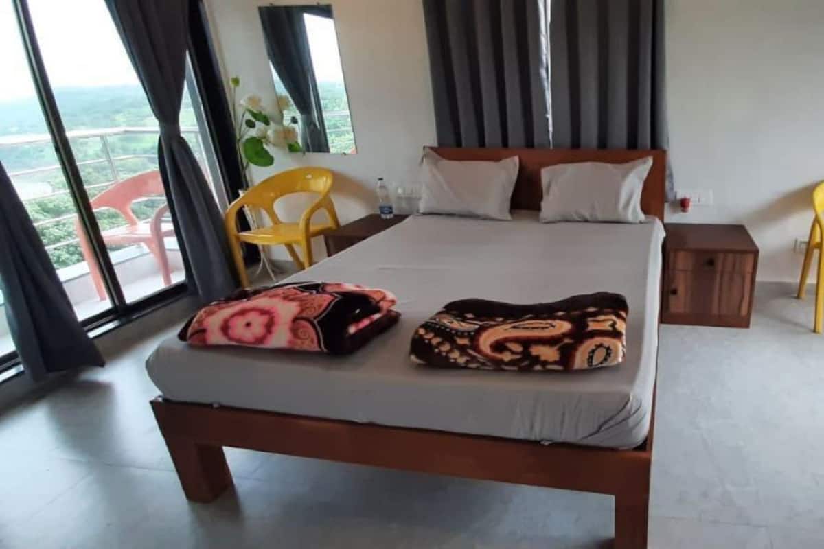 Habitación superior, balcón, vista a la ciudad | Wifi gratis 