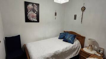 3 dormitorios, tabla de planchar con plancha, wifi gratis y ropa de cama