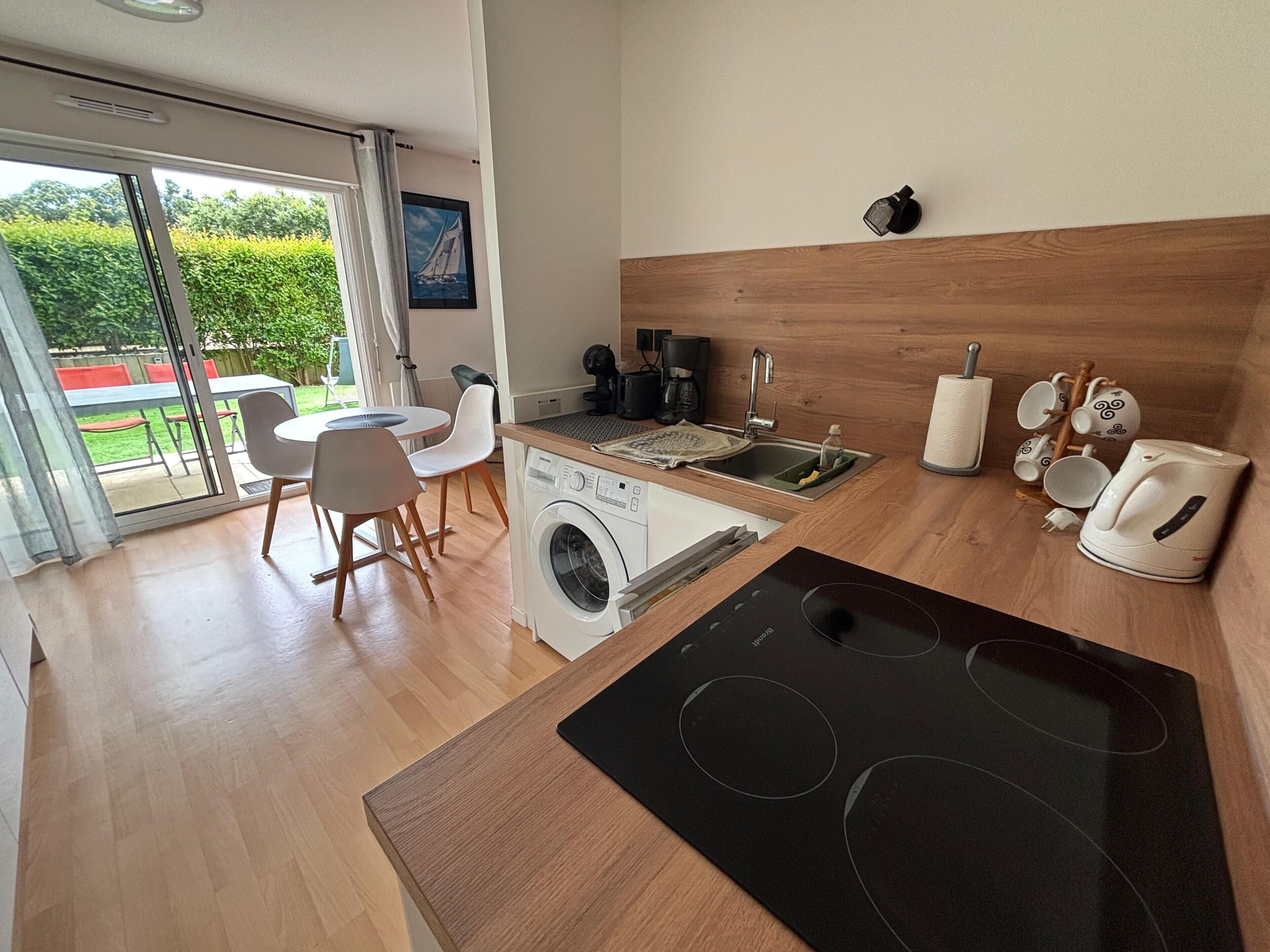 Coffee/tea maker, fridge, microwave, oven