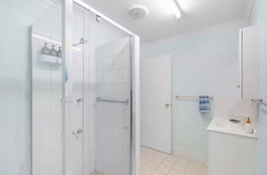 Shower, hair dryer, towels, soap