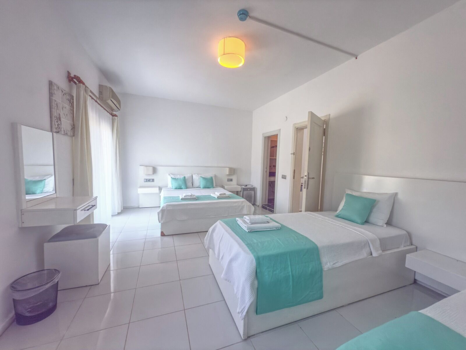 Quarto triplo standard, vista para o jardim | Wi-Fi de cortesia