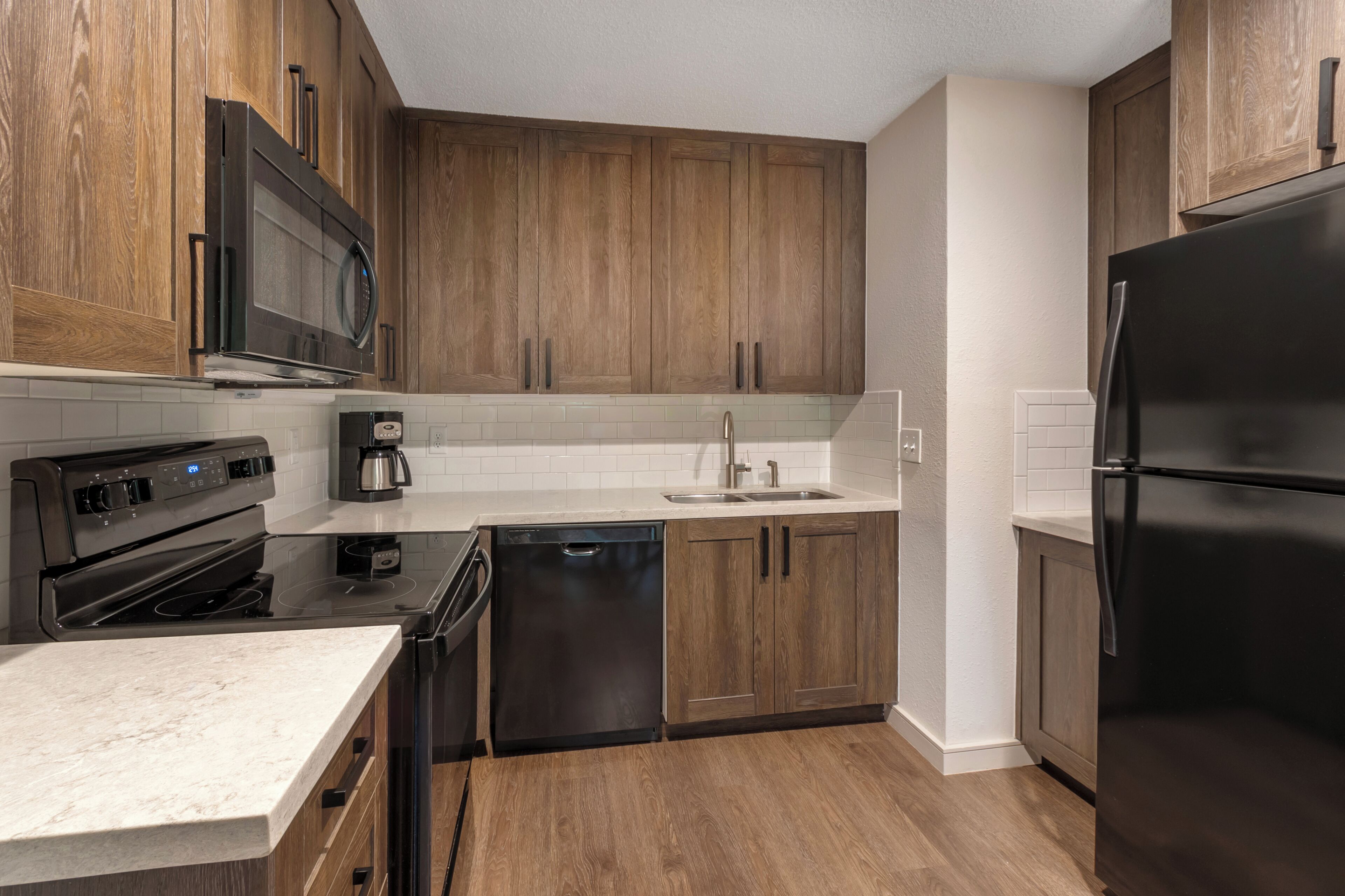 Coffee/tea maker, fridge, microwave, oven