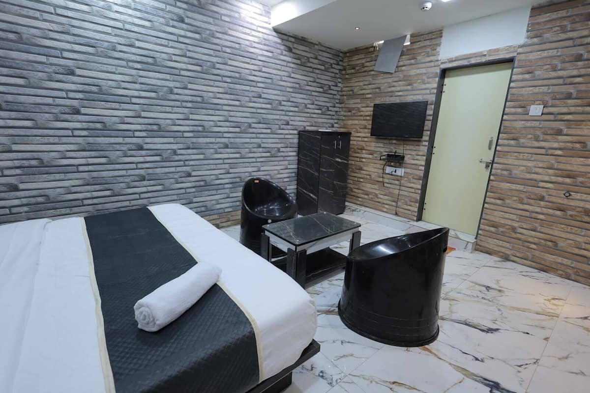 Habitación Deluxe | Escritorio, wifi gratis y ropa de cama