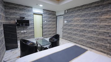 Habitación superior | Escritorio, wifi gratis, ropa de cama