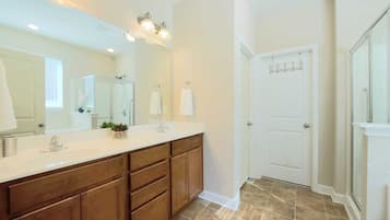 Shower, hair dryer, towels, toilet paper