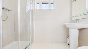 Shower, towels, toilet paper