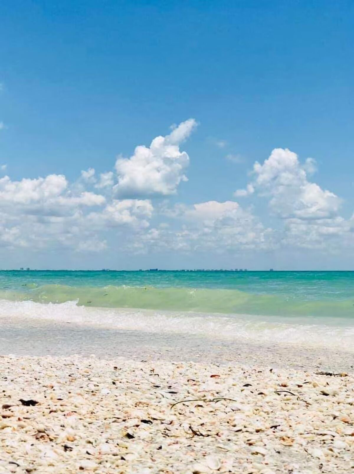 On the beach, sun loungers, beach towels
