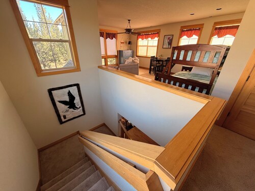 The Hideout at Eagle Crest Resort with a Private Hot Tub and Walking Distance to Lakeside Sport Center Pool, multiple living spaces, kids nook, sleeps 7.