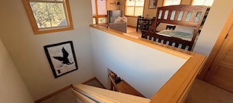 The Hideout at Eagle Crest Resort with a Private Hot Tub and Walking Distance to Lakeside Sport Center Pool, multiple living spaces, kids nook, sleeps 7.