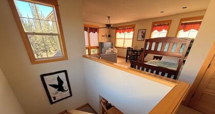 The Hideout at Eagle Crest Resort with a Private Hot Tub and Walking Distance to Lakeside Sport Center Pool, multiple living spaces, kids nook, sleeps 7.