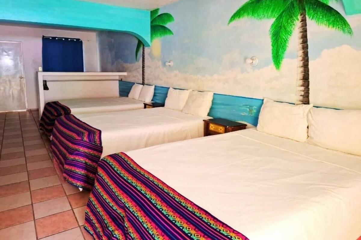 Habitación triple estándar, patio, vista al patio | Wifi gratis