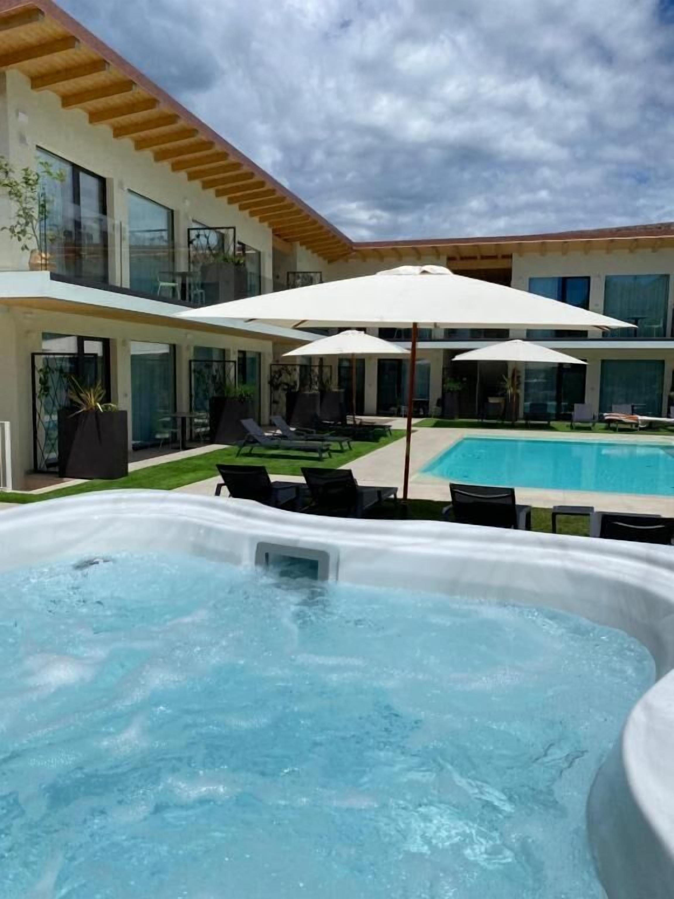 Seasonal outdoor pool, pool umbrellas, sun loungers