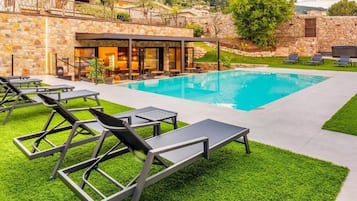 Seasonal outdoor pool, pool umbrellas, pool loungers