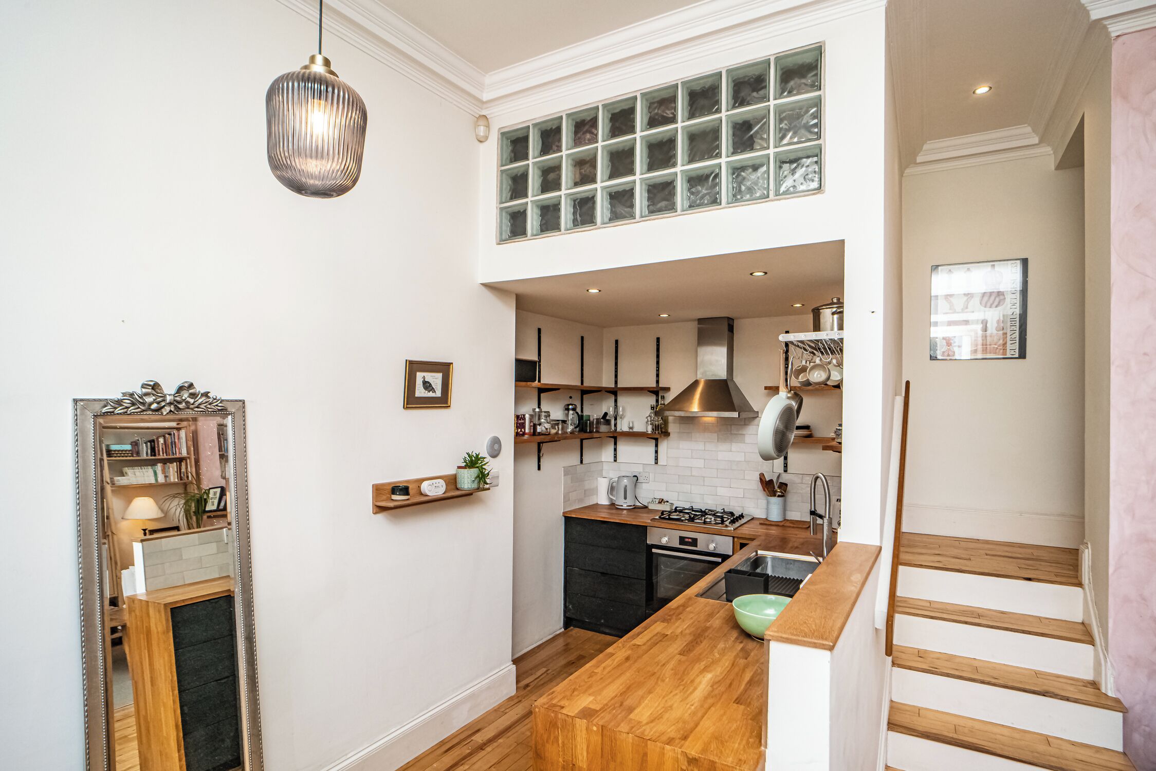 Fridge, oven, toaster, dining tables