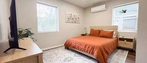 1 bedroom, desk, iron/ironing board, travel crib