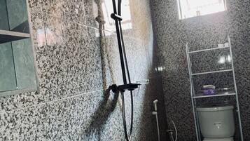 Shower, towels, soap, toilet paper