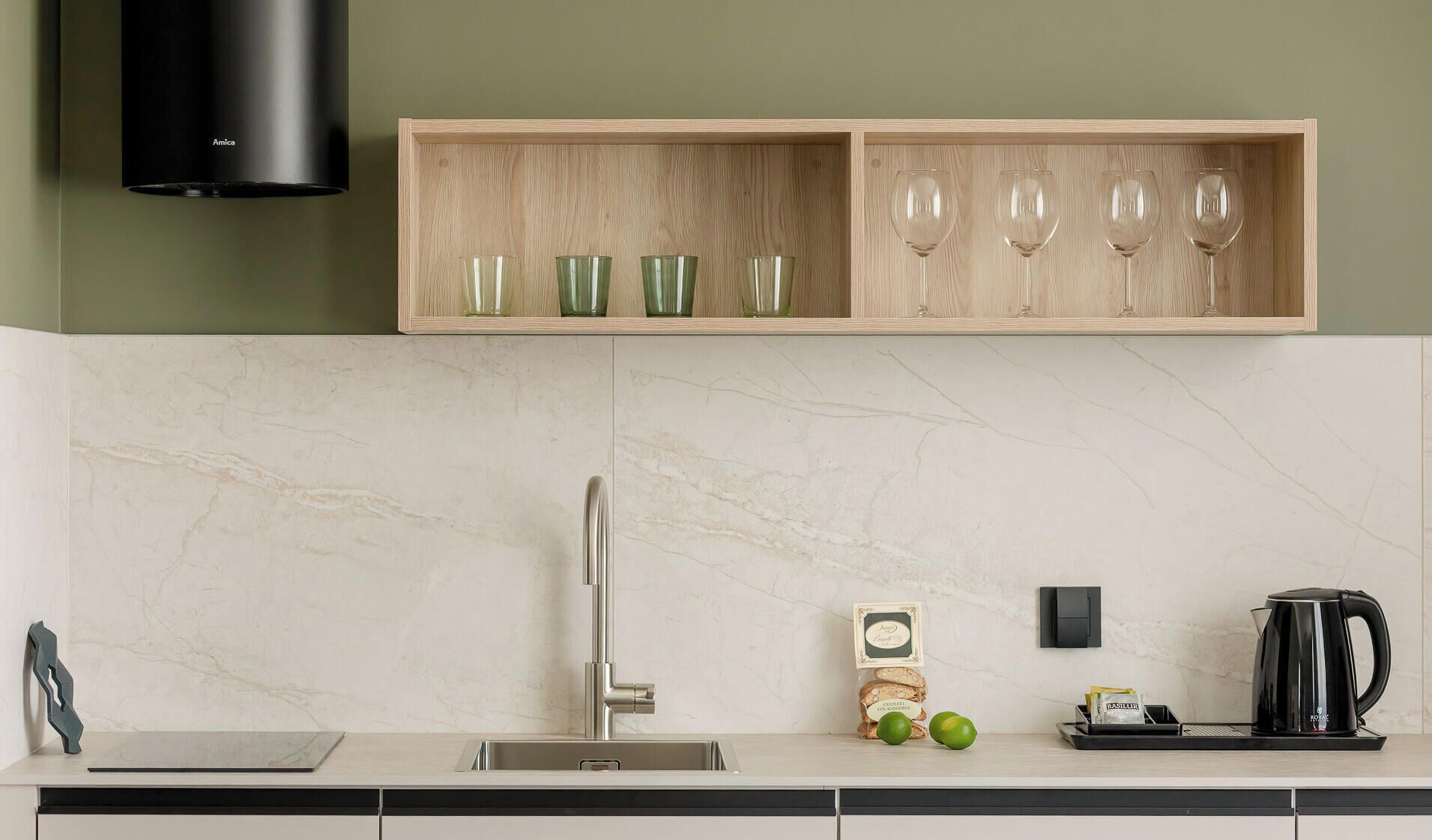 Deluxe Suite, City View | Private kitchen | Espresso maker, full-size fridge, stovetop, dishwasher
