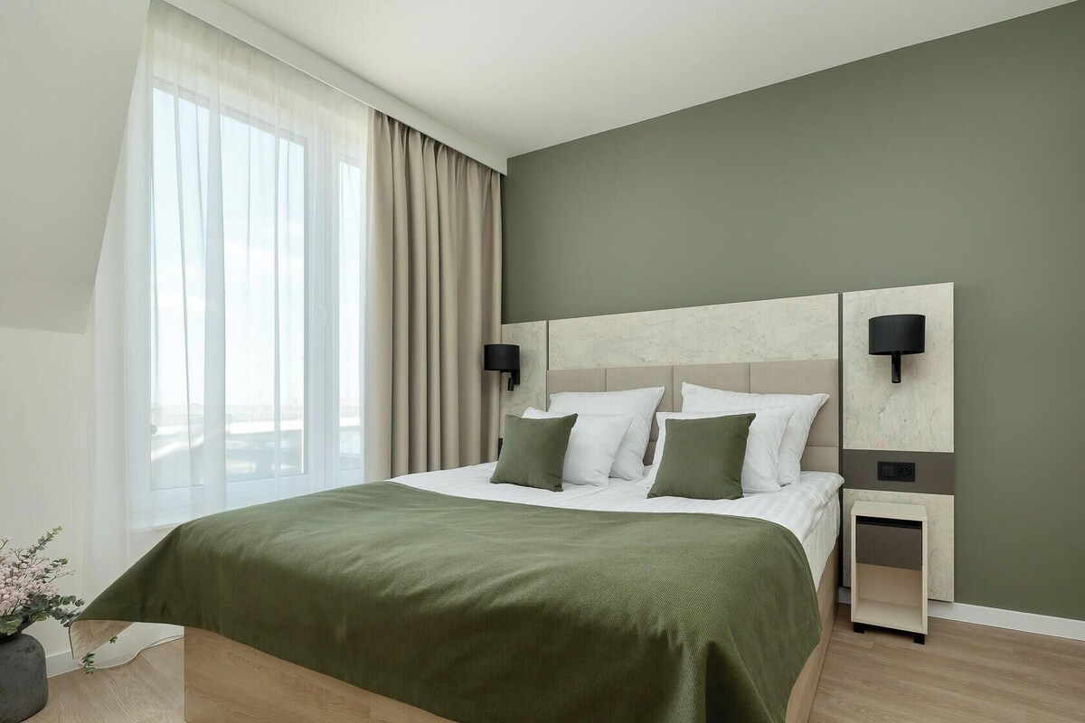 Superior Studio Suite, Harbour View | In-room safe, desk, laptop workspace, blackout curtains