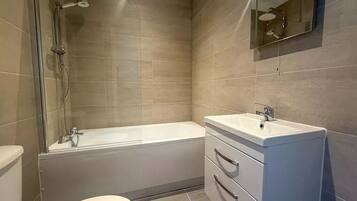Hair dryer, towels, soap, shampoo