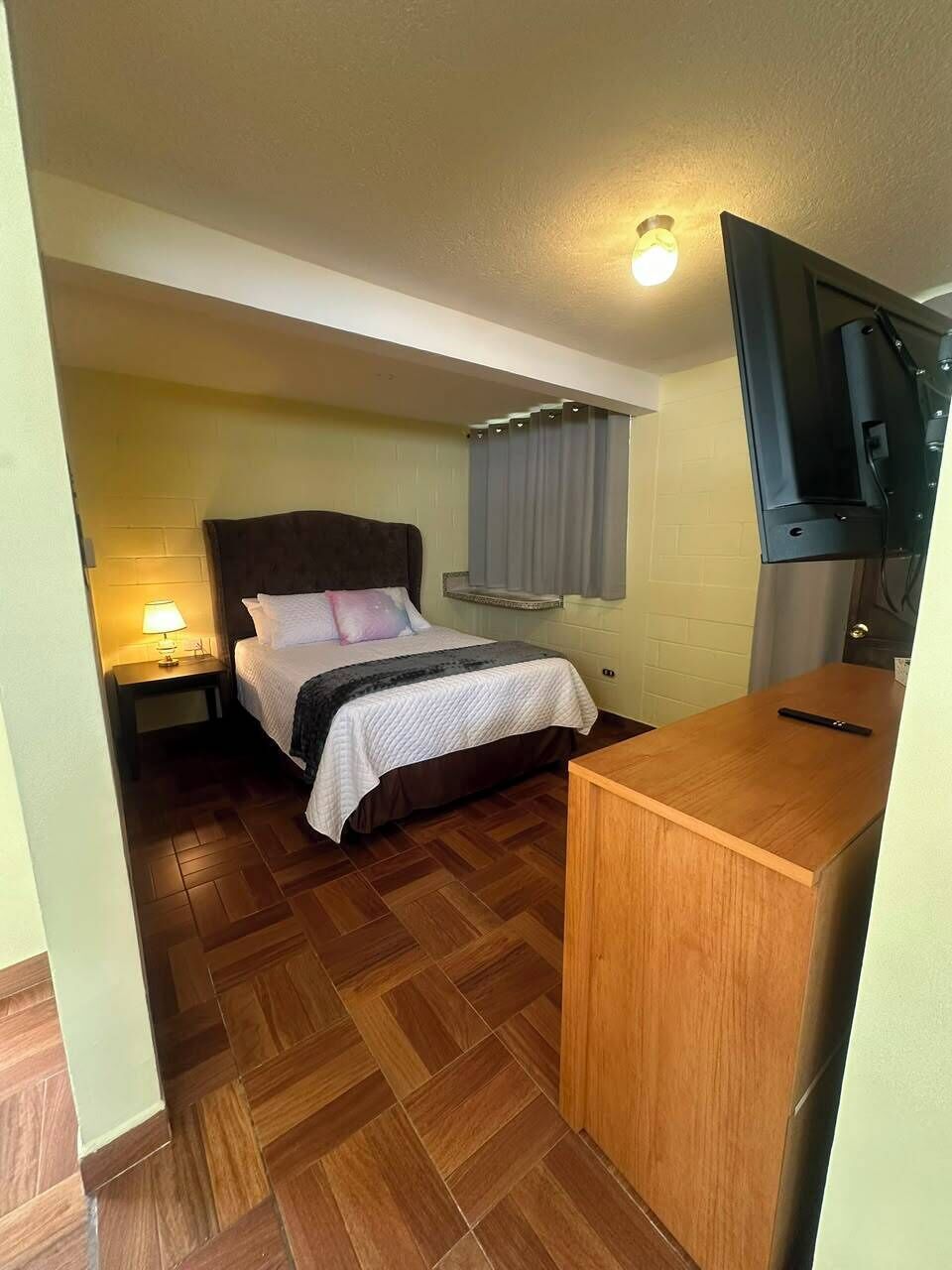 Economy Apartment | Desk, WiFi (free), bed sheets
