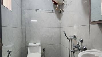 Shower, bidet, towels, soap