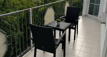 Modern studio with a stunning panoramic view, balcony, and kitchenette