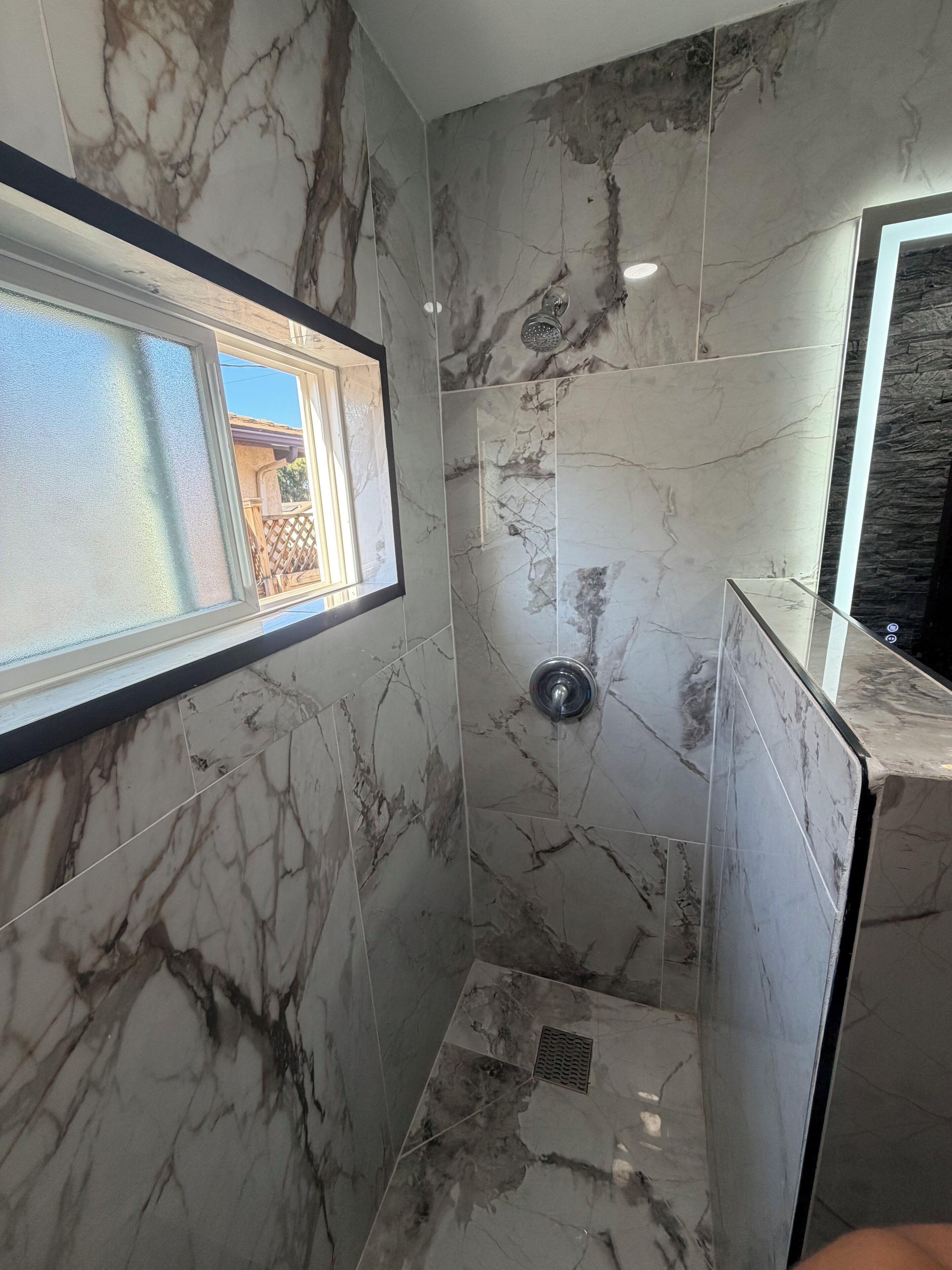 Shower, towels, soap, toilet paper