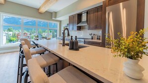 Coffee/tea maker, fridge, microwave, oven - Summit Suite on Main Street | Top-Floor Views (Canmore)