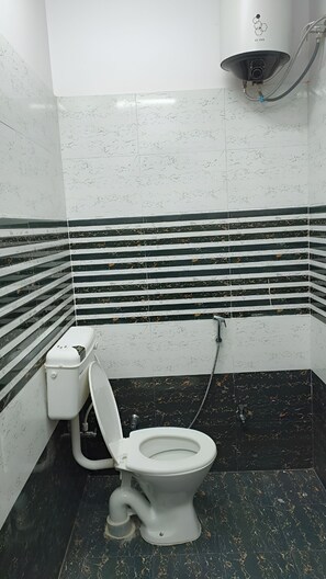 Dutxa, bidet, tovalloles i sabó 