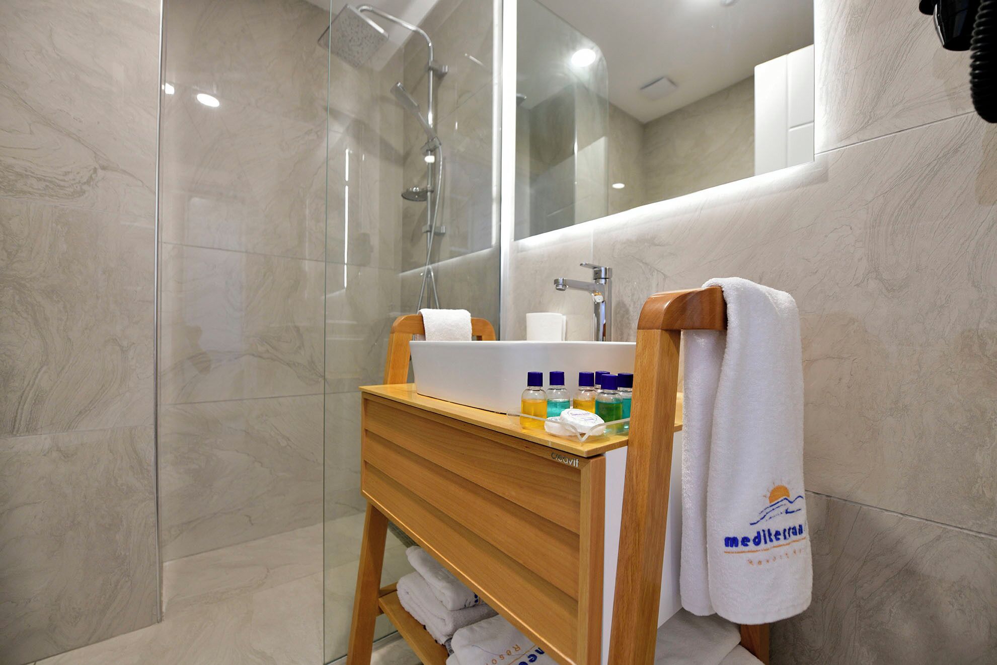 Comfort Room | Bathroom | Shower, hair dryer, slippers, towels
