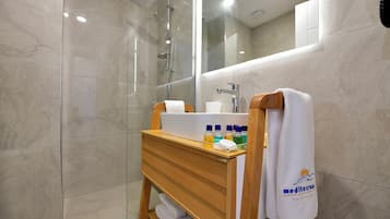 Comfort Room | Bathroom | Shower, hair dryer, slippers, towels