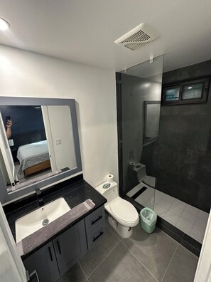 Shower, hair dryer, towels, soap