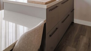 A modern kitchen with a white countertop, a built-in oven, and a large window with sheer curtains. - 2BR Rooftop Terrace in Rotterdam City Centre (Rotterdam)