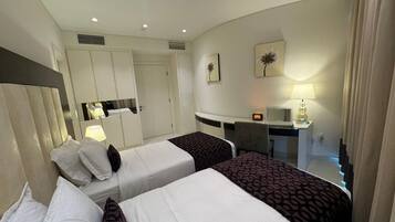 In-room safe, desk, laptop workspace, blackout curtains