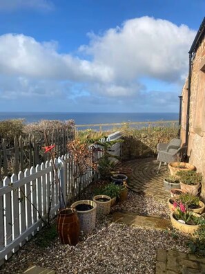 Terrace/patio - Cosy 1850s cottage in stunning coastal location - lovingly restored, (Cove)