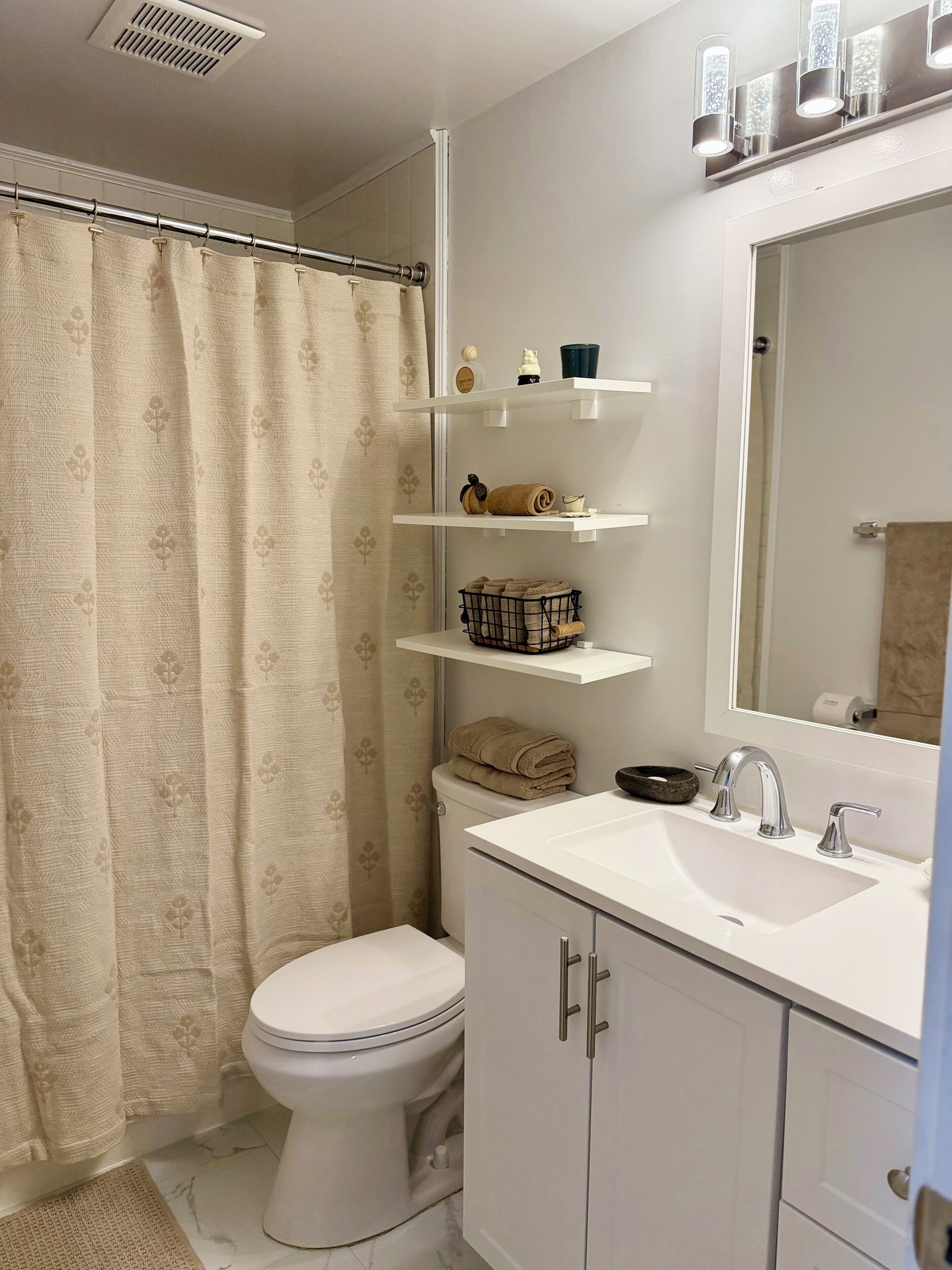 Hair dryer, towels, soap, toilet paper