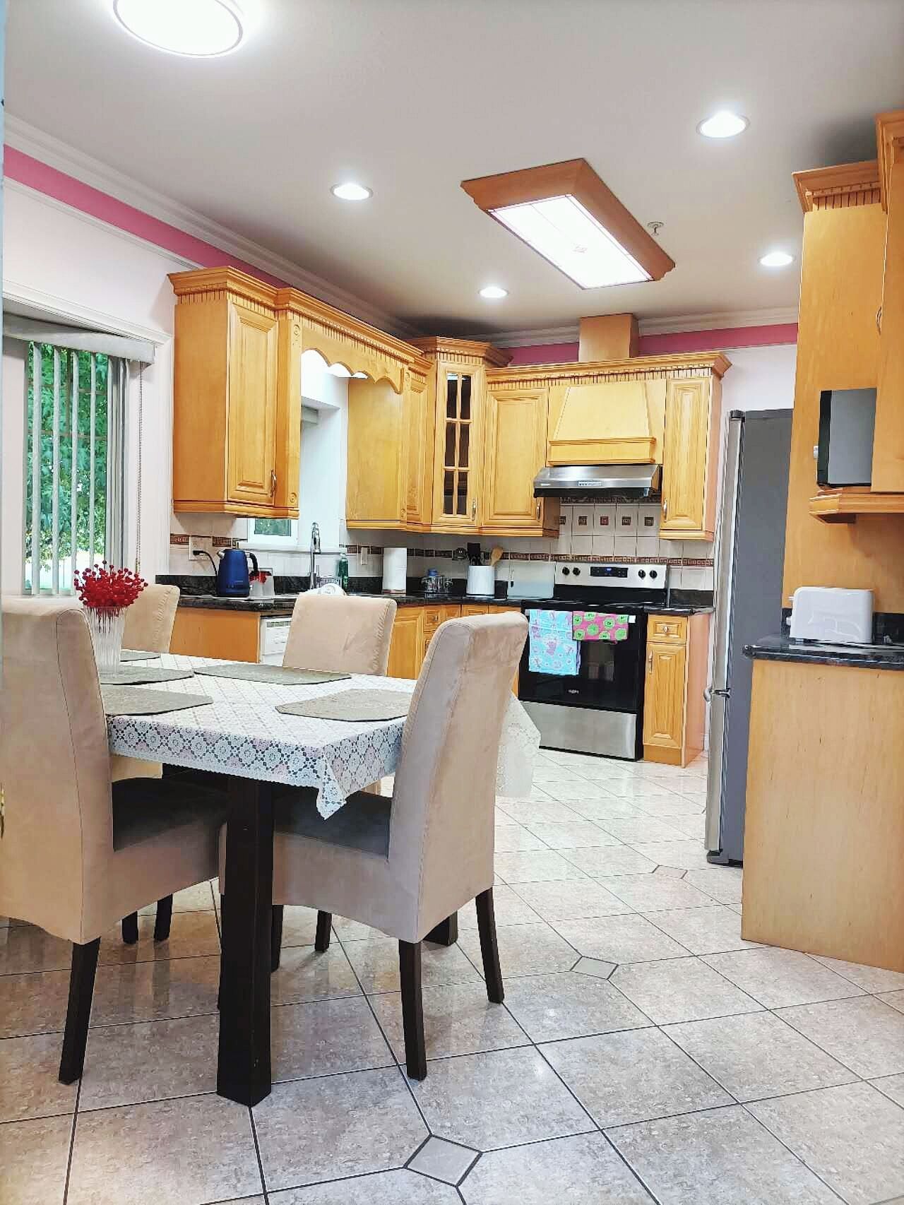 Full-size fridge, microwave, stovetop, dishwasher