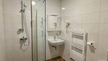 Basic Triple Room, Balcony, Courtyard View | Bathroom | Combined shower/tub, hair dryer, towels, soap