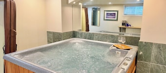 hot tub villa with a sauna room