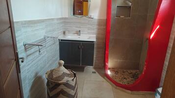 Shower, towels, soap, toilet paper